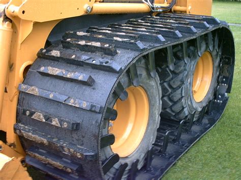 over the tire tracks for a skid steer|skid steer tracks near me.